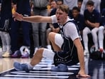 Cooper Flagg injured his left shoulder after taking a hard foul and hitting the floor during the game.