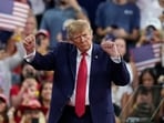 Trump campaigns for Republican candidates across the country, including in Texas, Kansas and Ohio, as the party plays defense in places it usually wins easily.(AP)