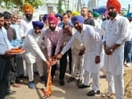 Mayor Sarabjit Singh Samana inaugurating the paver block work in Mauli Baidwan on Friday.