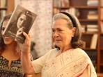 Congress Parliamentary Party Chairperson (CPP) and MP Sonia Gandhi, right, during the unveiling of her upcoming book 'Belonging: A Journey of Love'.(AICC)