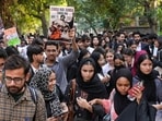 Students of Jamia Millia Islamia Law Department take out a peaceful 'black coat' march amid heightened security, in New Delhi, Thursday, Oct. 22, 2026. (PTI)