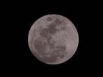 Why astrologers consider October’s full Moon auspicious and what it means (Photo by Karim JAAFAR / AFP)