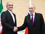 Russian President Vladimir Putin shakes hands with Iranian President Masoud Pezeshkian during a meeting in Turkmenbashi, Turkmenistan.(REUTERS)