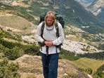 Karl Bushby carries his backpack through the mountains during his around-the-world Goliath Expedition.