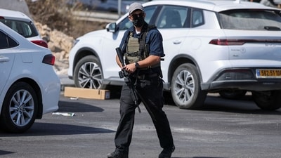 A member of Israeli forces guards the area on the day Israeli Prime Minister Benjamin Netanyahu visits the site following a shooting in Hebron. (File Photo/Reuters)