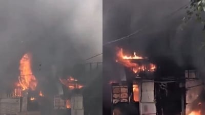 According to initial reports, the fire spread to nearby food outlets, with thick smoke billowing from the site.