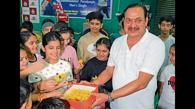 Kin and supporters of Nitesh Kumar celebrate his success in Karnal’s Karan Stadium on Saturday. (HT) Kin and supporters of Nitesh Kumar celebrate his success in Karnal’s Karan Stadium on Saturday. (HT)