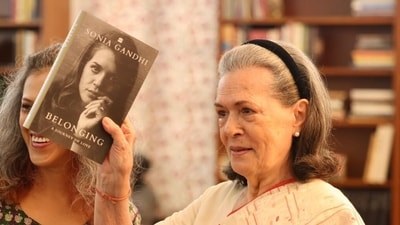 Congress Parliamentary Party Chairperson (CPP) and MP Sonia Gandhi, right, during the unveiling of her upcoming book 'Belonging: A Journey of Love'. (AICC)