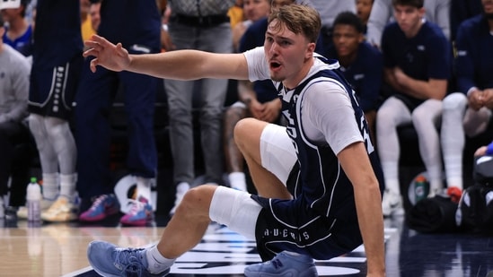 Cooper Flagg injured his left shoulder after taking a hard foul and hitting the floor during the game.(Getty Images via AFP)