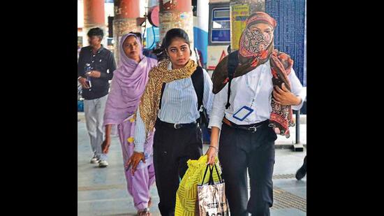 Commuters at the ISBT in Ludhiana on Saturday. (Gurpreet Singh/ht)