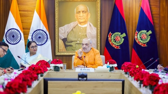 Union home minister Amit Shah and Delhi chief minister Rekha Gupta during a review meeting at Delhi Police headquarters, in New Delhi. (X/@PTI_News)