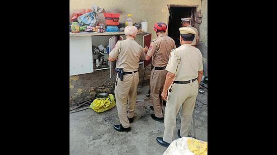 Police officials during the cordon and search operation in Ludhiana on Saturday. (HT)