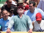 Lula, Bolsonaro’s son face off as Brazil votes in tight presidential race