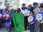 Himachal Pradesh chief minister Sukhvinder Singh Sukhu flagging off a walkathon in Shimla on Saturday. (HT File)