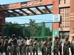 Heavy security is deployed as students of Jamia Millia Islamia stage a protest demanding entry to the campus amid an ongoing strike on Sunday. 