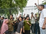 Students of Jamia Millia Islamia protesting outside university gate on Sunday. (Arvind Yadav/Hindustan Times)