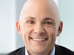 Andrew Cathy defends Chick-fil-A's Sunday policy.