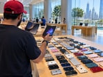 An Apple enthusiast in Dubai carried 53 old iPhones to a store while collecting two new iPhone Duo devices.