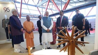 Prime Minister Narendra Modi and Uttar Pradesh chief minister Yogi Adityanath during the inauguration of a garment manufacturing plant in Varanasi on Sunday. (PTI PHOTO) Prime Minister Narendra Modi and Uttar Pradesh chief minister Yogi Adityanath during the inauguration of a garment manufacturing plant in Varanasi on Sunday. (PTI PHOTO)