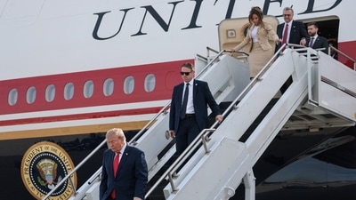 US President Donald Trump and Nicki Minaj disembark Air Force One at Selfridge Air National Guard Base, Michigan, US, October 25. (REUTERS)