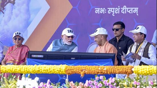 Prime Minister Narendra Modi, governor Anandiben Patel, Uttar Pradesh CM Yogi Adityanath and state BJP president Pankaj Chaudhary during the Indian Air Force Day Aerial Display 2026 in Varanasi on Sunday. (PTI PHOTO)