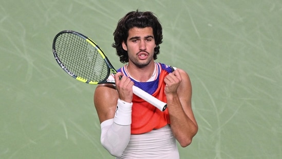 Spain's Carlos Alcaraz reacts during his men's singles match against Belgium's Zizou Bergs at the Shanghai Masters tennis tournament in Shanghai on October 12