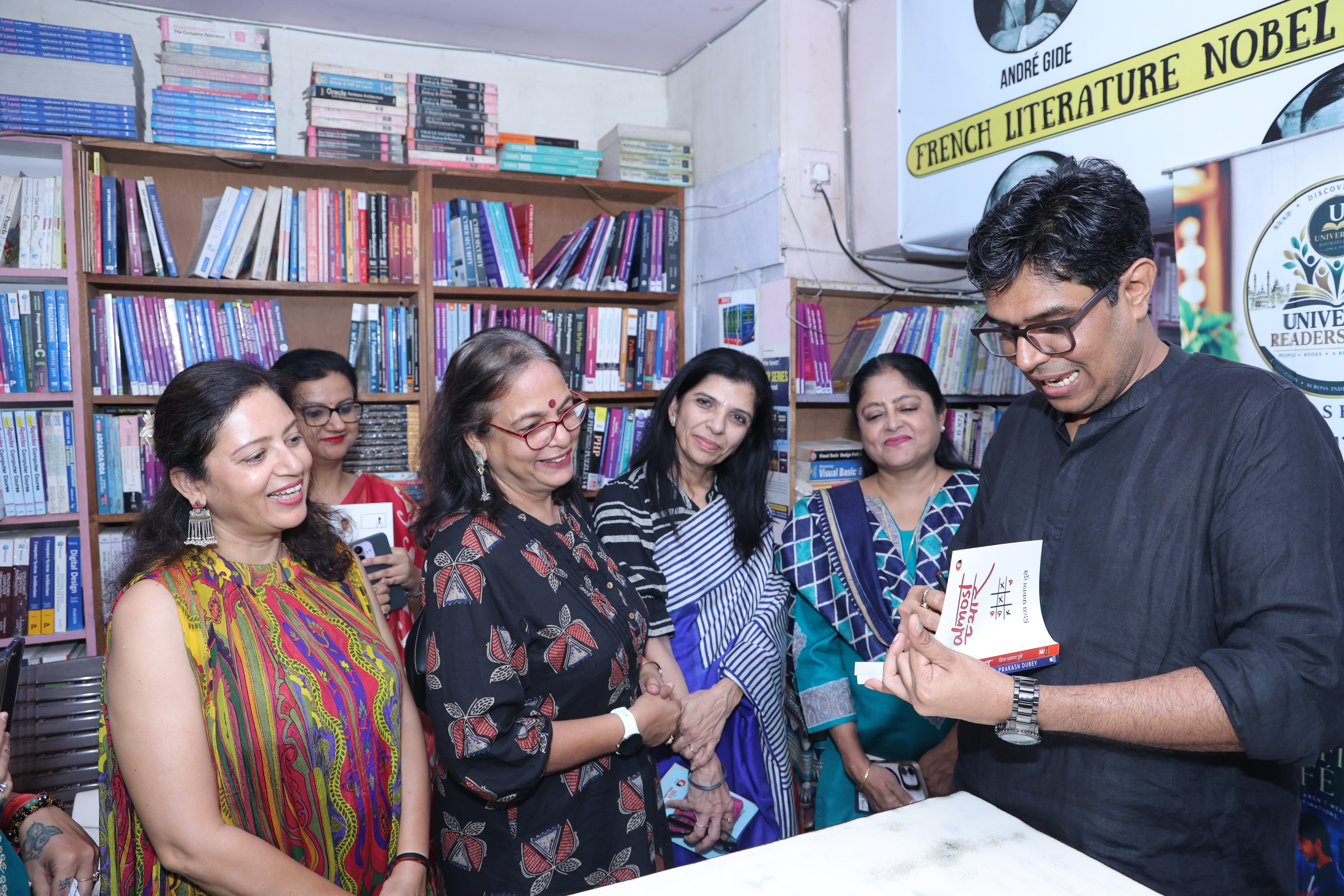 Divya signing books