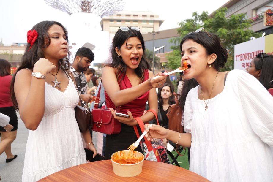 Tanushree Ghosh (centre) and her friends enjoy authentic Korean dishes at the festival. Tanushree Ghosh (centre) and her friends enjoy authentic Korean dishes at the festival.