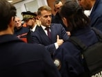 French President Emmanuel Macron meets police officers and rescue forces at the town hall in Trappes, near Paris, France, Friday Oct. 23, 2026, after a shooting in the Parisian suburb left one person dead and several others wounded. AP/PTI(AP10_24_2026_000007B)(AP)