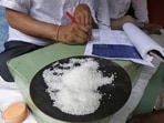 FILE PHOTO: A sample of sugar crystals are seen on the desk of a trader at a wholesale market in Kolkata, India April 26, 2016. REUTERS/Rupak De Chowdhuri/File Photo (REUTERS)