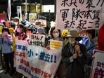 People protest against the killing of a woman in Okinawa allegedly committed by a US Marine Corps member, in front of the Prime Minister's Office in Tokyo on October 5, 2026.