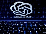 A keyboard is placed in front of a displayed OpenAI logo in this illustration taken February 21, 2023.
