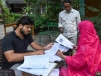 New Delhi, India - Oct. 25, 2026:   Voters visit a special camp for enrolment and correction of electoral details after receiving notices during the final round of special camps under the ongoing Special Intensive Revision (SIR) of electoral rolls at Okhla in New Delhi, India, on Sunday, October 25, 2026.  (Photo by Arvind Yadav/ Hindustan Times)