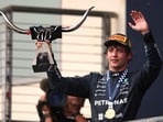 Andrea Kimi Antonelli of Italy and Mercedes AMG Petronas F1 Team celebrates on the podium.