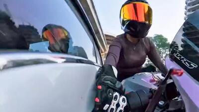 A video grab of the alleged incident on September 13. Police said Chauhan accelerated to get away, but the driver allegedly pursued her, caught up with her motorcycle and abruptly changed lanes, hitting her before fleeing. Other bikers tried to stop the car at a traffic signal, but the driver sped away (HT Photo)