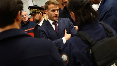 French President Emmanuel Macron meets police officers and rescue forces at the town hall in Trappes, near Paris, France, Friday Oct. 23, 2026, after a shooting in the Parisian suburb left one person dead and several others wounded. AP/PTI(AP10_24_2026_000007B) (AP) French President Emmanuel Macron meets police officers and rescue forces at the town hall in Trappes, near Paris, France, Friday Oct. 23, 2026, after a shooting in the Parisian suburb left one person dead and several others wounded. AP/PTI(AP10_24_2026_000007B) (AP)
