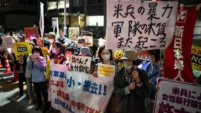 People protest against the killing of a woman in Okinawa allegedly committed by a US Marine Corps member, in front of the Prime Minister's Office in Tokyo on October 5, 2026. (AFP) People protest against the killing of a woman in Okinawa allegedly committed by a US Marine Corps member, in front of the Prime Minister's Office in Tokyo on October 5, 2026. (AFP)