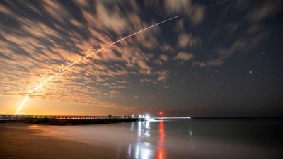 FILE PHOTO: The SpaceX Falcon 9 rocket carrying Starlink satellites is seen over Sebastian Inlet after launching from Cape Canaveral, Florida, U.S., February 26, 2025. (REUTERS)