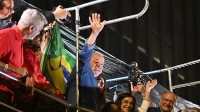 Brazil's President and presidential candidate Luiz Inacio Lula da Silva gestures to supporters after winning the presidential runoff election in Sao Paulo, Brazil. (AFP)