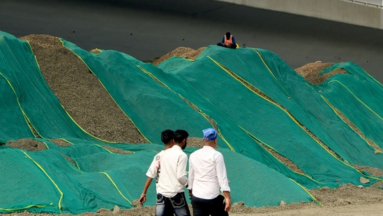  The green nets placed over the soil mounds at Haji Ali area mandated dust-mitigation and air pollution control measure and infrastructure excavation sites across Mumbai area,