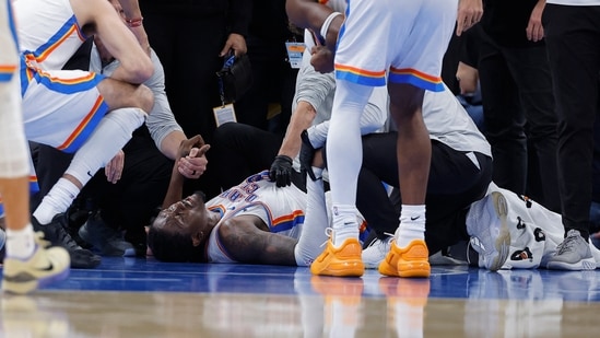 Oklahoma City, Oklahoma, USA; Oklahoma City Thunder guard Jalen Williams (8) lays on the floor after getting injured on a play against the Los Angeles Clippers during the second half at Paycom Center. Mandatory Credit: Alonzo Adams-Imagn Images