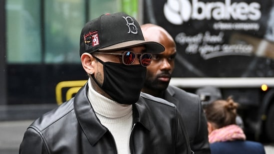 US singer Chris Brown arrives at Southwark Crown Court where he is due to be sentenced after pleading guilty to affray over an incident in which prosecutors said he attacked a music producer with a bottle in a London nightclub in 2023, in London, Britain, October 26, 2026. REUTERS/Chris J Ratcliffe