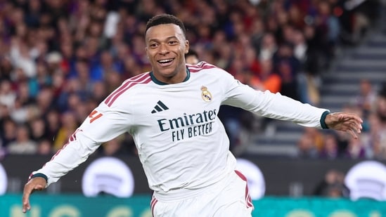 Real Madrid's French forward #10 Kylian Mbappe celebrates. (AFP)