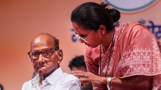NCP (SP) chief Sharad Pawar with his daughter and MP Supriya Sule during the 27th foundation day of the original party he founded, in Mumbai on June 10, 2026. (PTI File Photo)