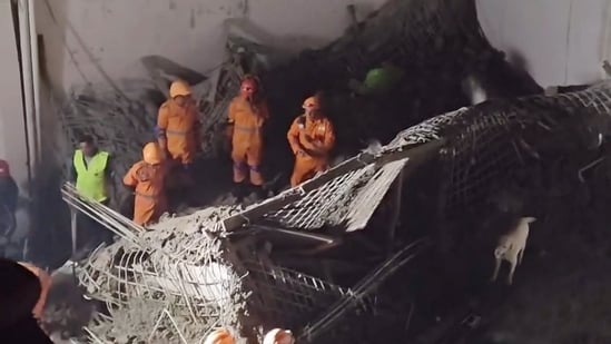 NDRF personnel at the site after a slab of a house under construction collapsed in Milan Garden in northeast Delhi's Harsh Vihar area, Sunday, October. 25, 2026.