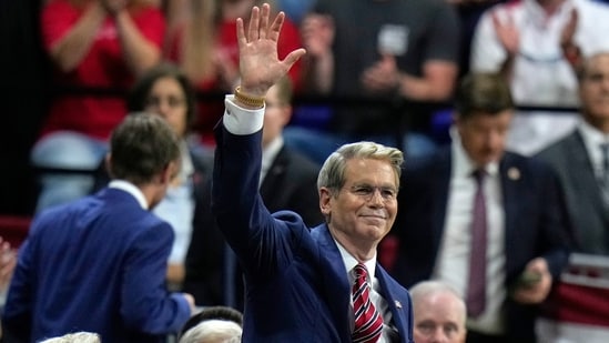 Treasury Secretary Scott Bessent waves as President Donald Trump speaks during a campaign rally, Friday, Oct. 23, 2026, at Alico Arena on the campus of Florida Gulf Coast University in Fort Myers, Fla. (AP Photo/Chris O'Meara)(AP Photo/Chris O'Meara)
