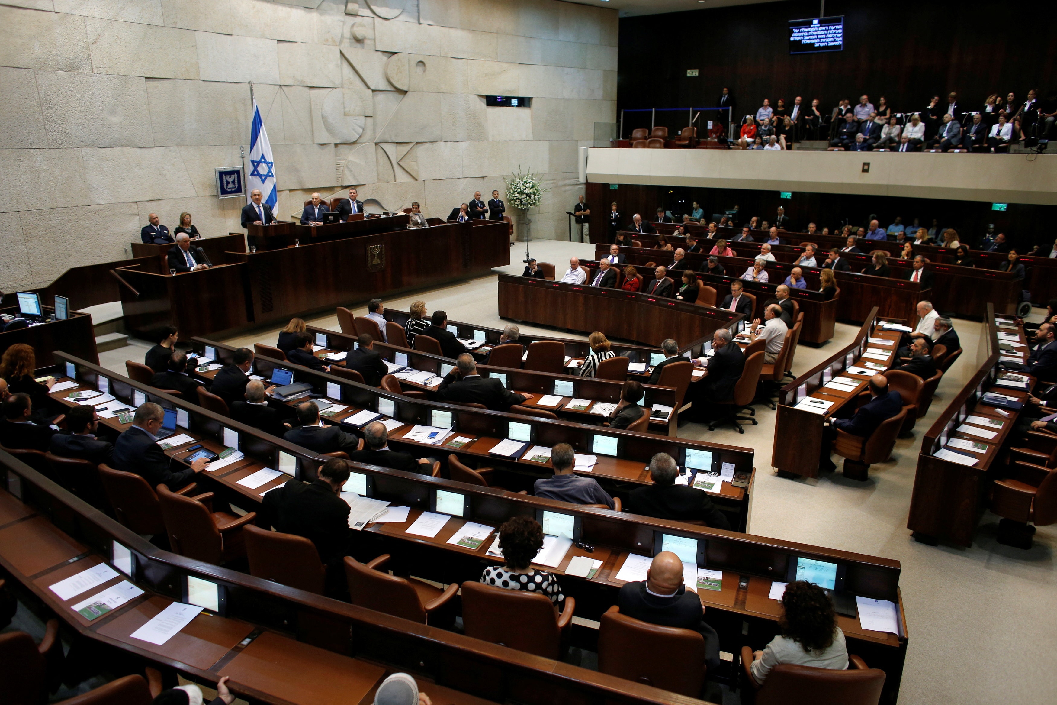 The 120-member Knesset, Israel’s parliament, requires a majority of 61 seats to form the government. (Reuters)