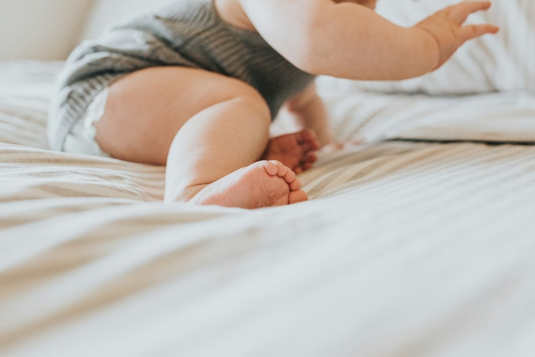 For babies, movement starts early — even before first steps. Infants need short bursts of active, floor-based play several times a day. (Unsplash) For babies, movement starts early — even before first steps. Infants need short bursts of active, floor-based play several times a day. (Unsplash)