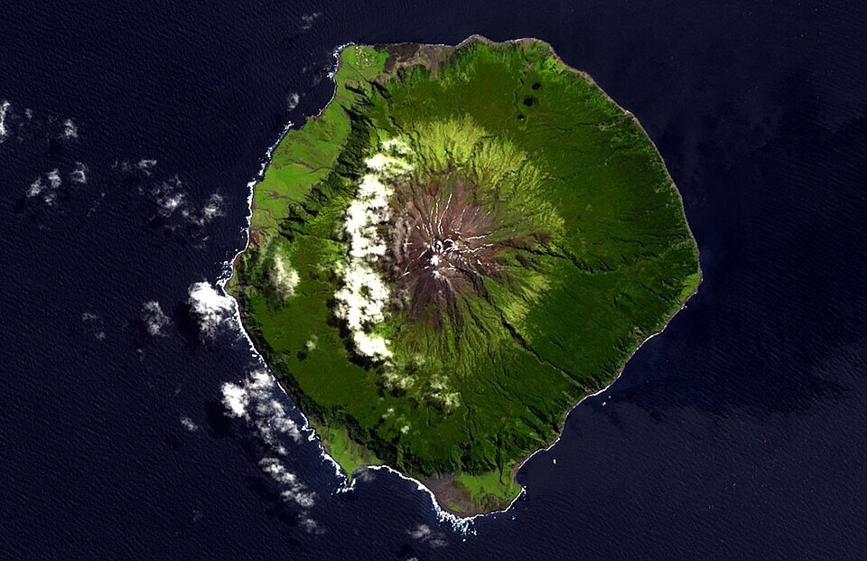 Tristan da Cunha, as seen by NASA’s Terra satellite. The 1961 eruption forced its entire population to flee. (Wikimedia Commons) Tristan da Cunha, as seen by NASA’s Terra satellite. The 1961 eruption forced its entire population to flee. (Wikimedia Commons)