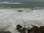 A view of unusual rough sea conditions along the coast under the impact of Cyclone Arnab, in Visakhapatnam on Tuesday. (ANI Video Grab)